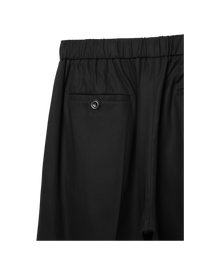 VAVA STORE pet-tree-kor Gaze black cotton pants with elastic waistband, front pleats, and a buttoned welt pocket.
